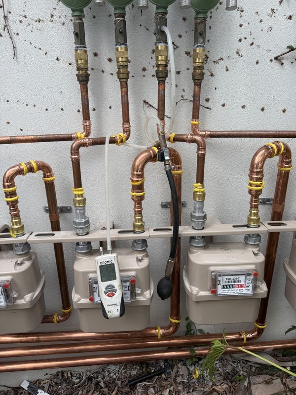 Gas meter manifold undergoing a pressure test