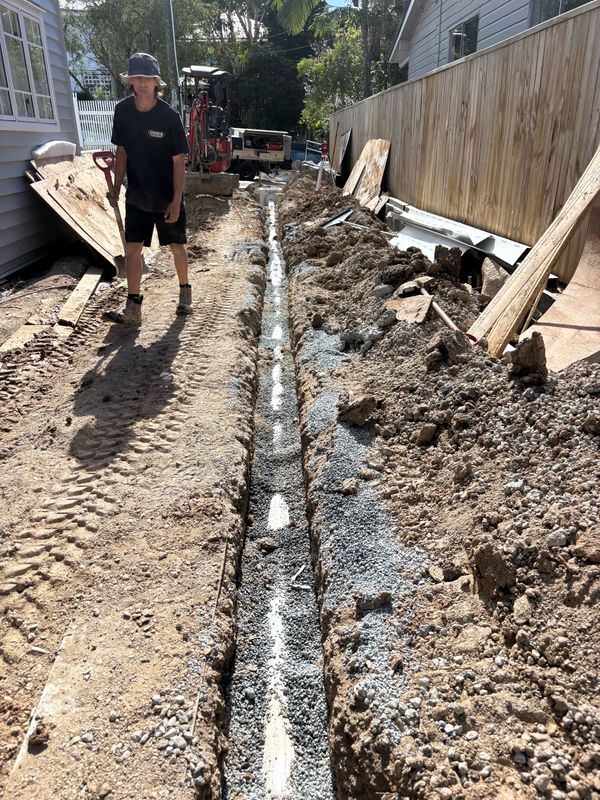 Long sewer trench at a residential site